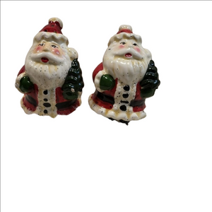 Vintage Santa holding Christmas tree salt & pepper shakers